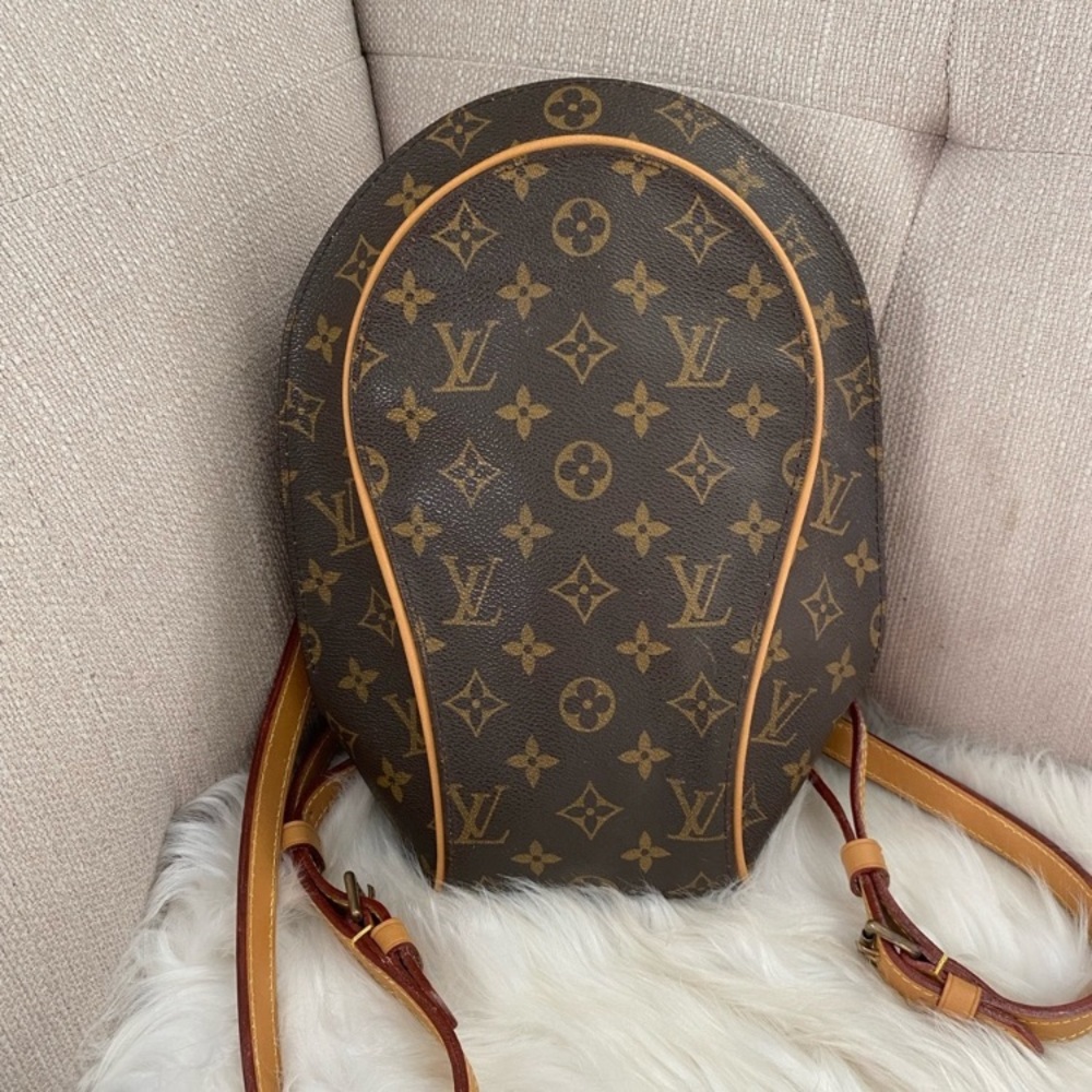 Louis Vuitton Monogram Backpack with Tan Accents w/ lock and key. Authentic.